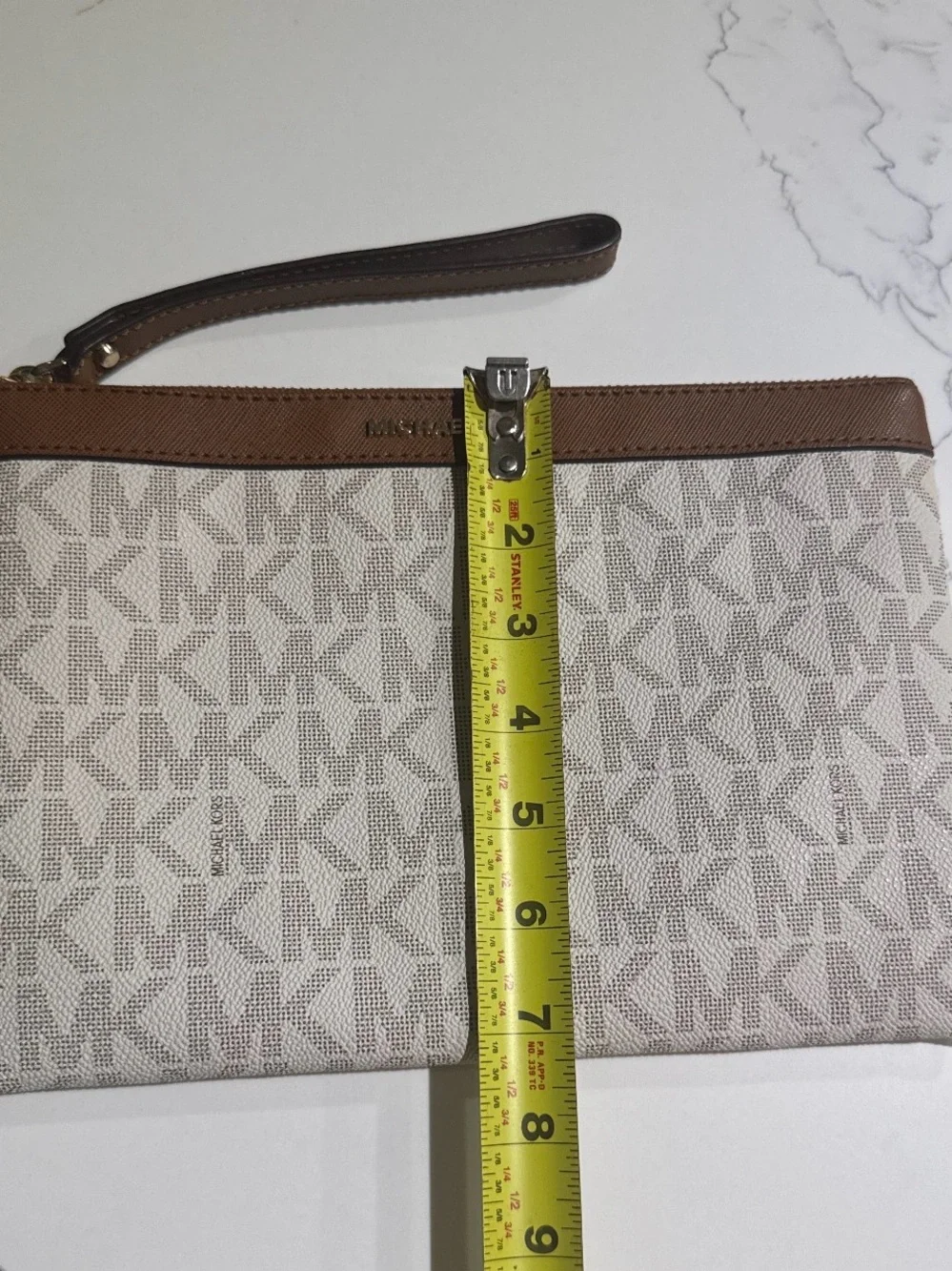 Michael Kors Beige MK Monogram clutch/wristlet with Brown Trim